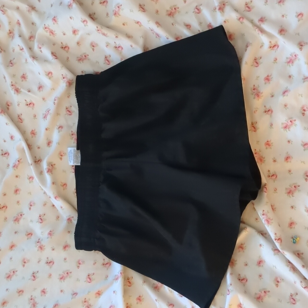 Girls black athletic shorts, size L